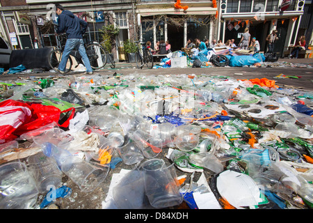 Litter on the streets of Amsterdam following the annual Queen day celebrations, Netherlands. Stock Photo