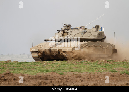An Israel Defense Force Merkava Mark IV main battle tank in the Golan Heights. Stock Photo