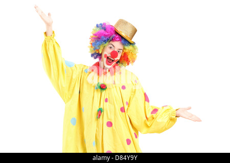 Funny circus clown gesturing with hands isolated on white background Stock Photo