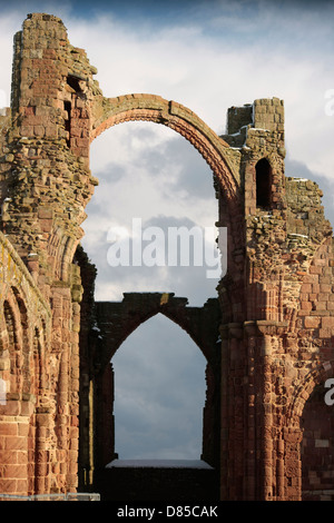 Arches Abandoned monastery on Lindisfarne Monks arrived here to establish the site in AD 635 Stock Photo