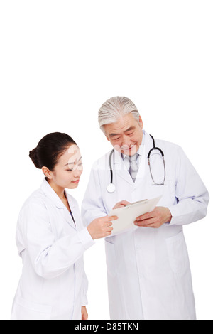 Two oriental doctors discuss work Stock Photo