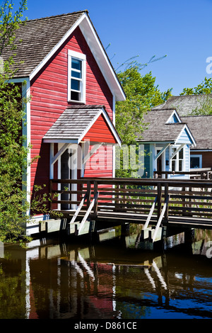 Housing with access over water at the restored Britannia Shipyard in Steveston, near Vancouver. Stock Photo
