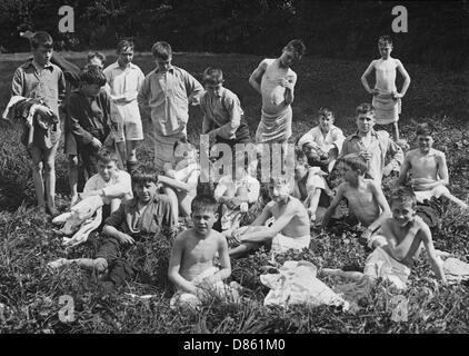 Boys Club, swimming and relaxing by river, 1928 Stock Photo - Alamy