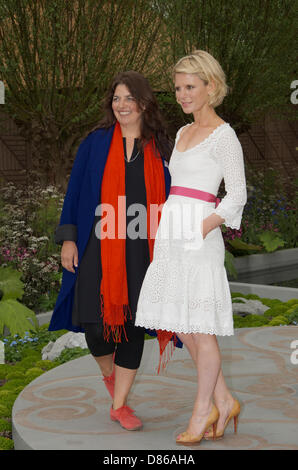 Emilia Fox and designer Jinny Blom in the B&Q Sentebale Forget-Me-Not Show Garden at RHS Chelsea Flower show London, UK on Press Day 20th May 2013. The garden is inspired by Prince Harry and Prince Seeiso of Lesotho's charity Sentebale whichh helps vulnerable children in Lesotho in Southern Africa. Stock Photo