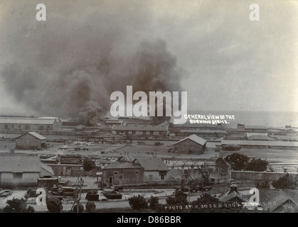 Smoke from shelled fuel tanks in Madras Stock Photo