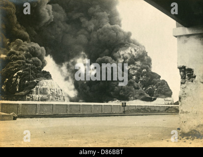 Smoke from shelled fuel tanks in Madras Stock Photo