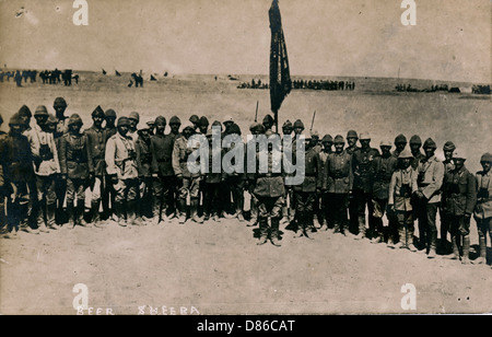 Group of soldiers with flag, Beersheba, Middle East Stock Photo