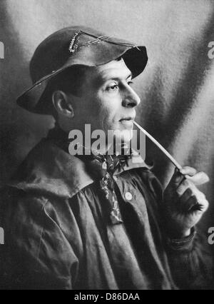 Portrait of a farmers boy smoking a pipe. Stock Photo