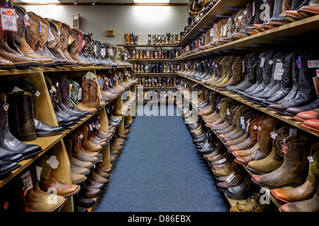 Cowboy boots for sale at the Wrangler western wear store in Cheyenne, Wyoming Stock Photo