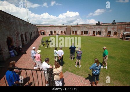 Tourists view Fort Macon State Park May 12, 2013 in Atlantic Beach, NC. Fort Macon was constructed after the War of 1812 to defend Beaufort Harbor. Stock Photo