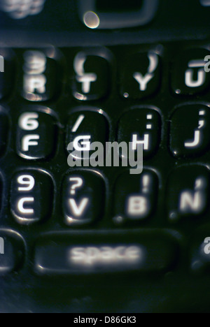 Macro shot of smart phone keyboard with G in focus Stock Photo