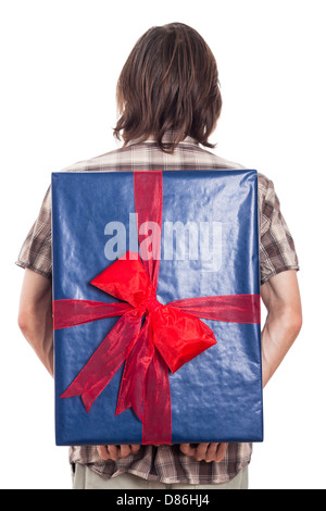 Rear view of a man holding big blue gift box, isolated on white background Stock Photo