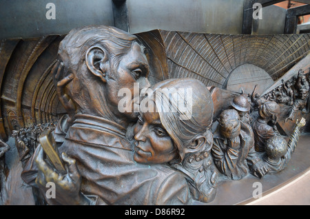 'The Meeting Place' statue (designed by British artist Paul Day) at St. Pancras International railway station in London, UK. Stock Photo