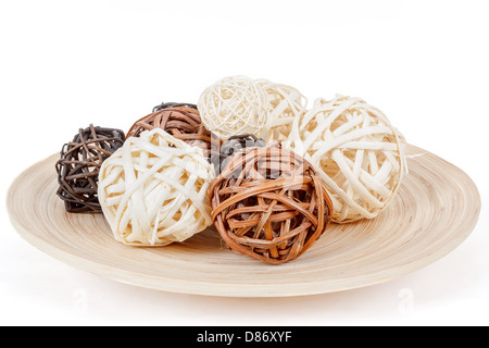 decorative wicker wooden balls on isolated white Stock Photo