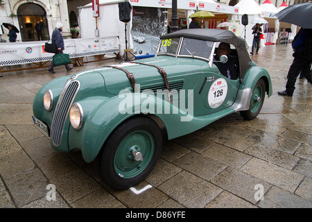 A vintage 1939 BMW 328 competes in the 1000 mile Mille Miglia round trip from Brescia to Rome and back again. Stock Photo