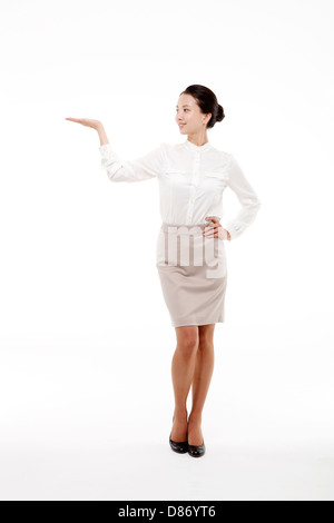 Woman posing with hand on hip Stock Photo - Alamy
