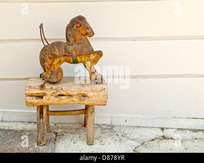 Very old child toy, horse, antique, old Greek toy against white wall Stock Photo