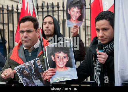 Bahraini protesters outside Downing Street in London accusing UK government of supporting Bahrain tyranny Stock Photo