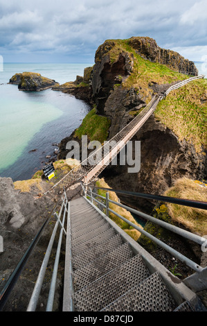 Vertigo inducing view down on  Carrick-a-Rede rope bridge. Stock Photo