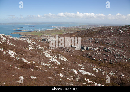 The Wales Coastal Path in North Wales. Picturesque aerial view from Holyhead Mountain with town of Holyhead in the background. Stock Photo