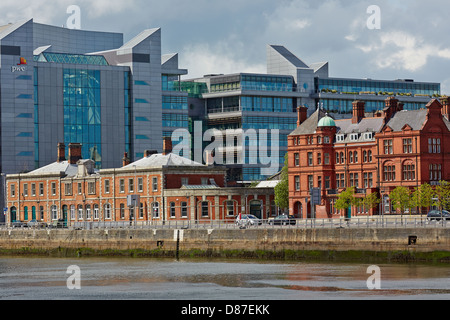 Old and new buildings sit side-by-side on North Wall Quay, Dublin Docks, Dublin, Ireland Stock Photo
