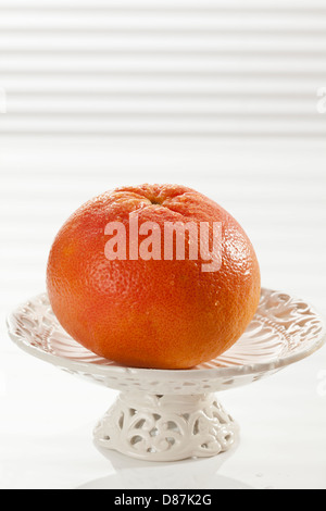 Grapefruit in fruit bowl, close up Stock Photo