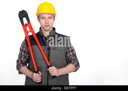 craftsman holding a huge spanner Stock Photo