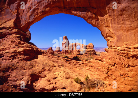 Arches National Park, Turret Arch seen through the North Window, Moab, Utah. (USA) Stock Photo