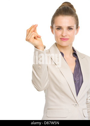 Confident business woman snapping fingers Stock Photo