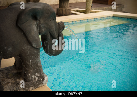 Elephant shaped fountains at the pool Stock Photo