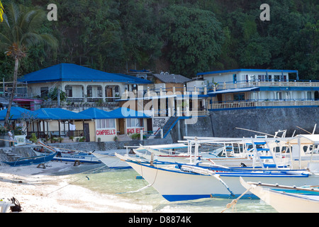 Typical Ferry Boat on the Big La Laguna Beach on Mindoro Island, Philippines Stock Photo