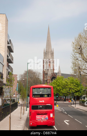 View of St. Augustine's Church showing double decker bus, Kilburn, London, England, United Kingdom, GB Stock Photo