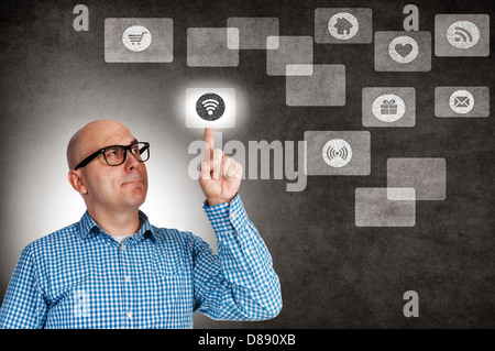 Man touching wireless connection button Stock Photo