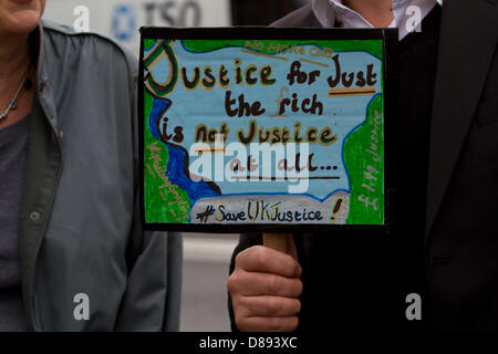 London, UK. 22nd May 2013. Members of the legal profession including barristers and legal aid lawyers stage a protest outside Parliament in Westminster against proposed government changes and cuts to legal aid.  Credit: Amer Ghazzal/Alamy Live News Stock Photo