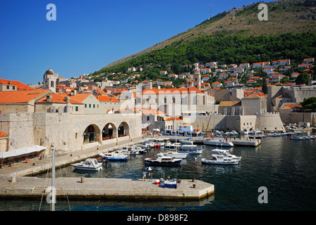 DUBROVNIK, CROATIA. A view of the harbour and medieval walled town, with Mount Srd behind. 2010. Stock Photo