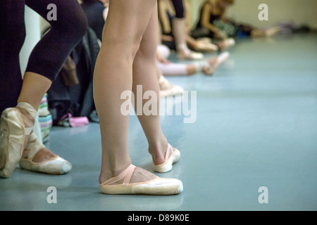 Several ballet dancers inside the studio Stock Photo