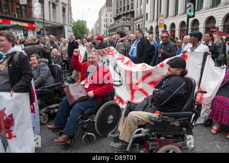 London, UK. 22nd May 2013.  Disabled people block Tottenham Court Road in London demanding rights for disabled people in the workplace and on benefits. This follows victory in a High Court ruling against work capability assessment for mental health. Credit: Paul Davey/Alamy Live News Stock Photo