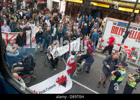 London, UK. 22nd May 2013.  Disabled people block Tottenham Court Road in London demanding rights for disabled people in the workplace and on benefits. This follows victory in a High Court ruling against work capability assessment for mental health. Credit: Paul Davey/Alamy Live News Stock Photo