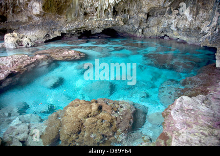 Sea water pool inside Avaiki Cave, Alofi, Niue, South Pacific Island. Stock Photo