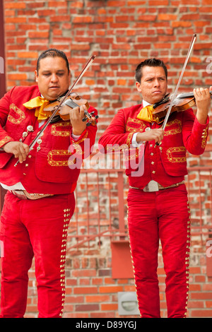 Mexican Mariachi singers and dancers performing in Centennial Square at AfricaFest-Victoria, British Columbia, Canada. Stock Photo