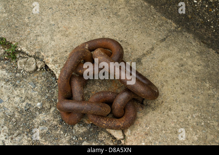 Mooring chain on quayside, Aberaeron, Wales Stock Photo