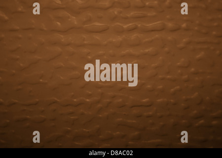 Rough texture of bumpy brown objects closeup. Close up of soluble ...
