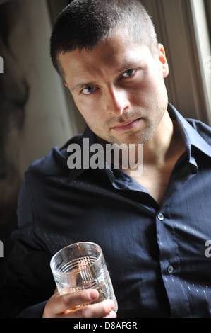 Male actor head shot showing action movie character Stock Photo