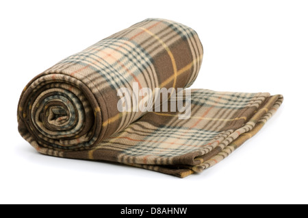 Rolled plaid wool blanket isolated on white Stock Photo