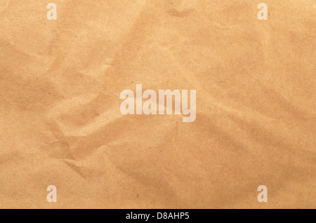 Brown rough crumpled recycled paper texture Stock Photo