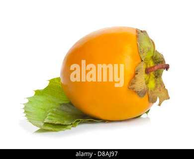 Persimmons with green leaves isolated on white