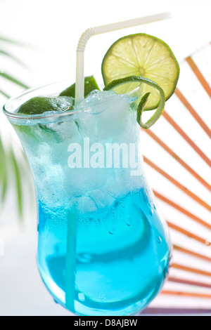 Blue drink cocktail with ice and lemon Stock Photo - Alamy