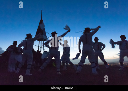 Morris dancers, dancing up the sun on top of Mount Eden at dawn on May Day, Auckland New Zealand Stock Photo