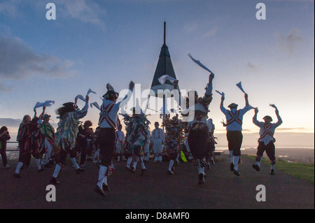 Morris dancers, dancing up the sun on top of Mount Eden at dawn on May Day, Auckland New Zealand Stock Photo