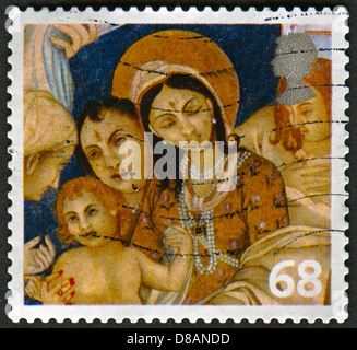UK - CIRCA 2005: A stamp printed in UK shows image of the Madonna and the Infant Jesus (from India), circa 2005.  Stock Photo